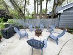 Shared patio with fire pit and propane barbeque grill